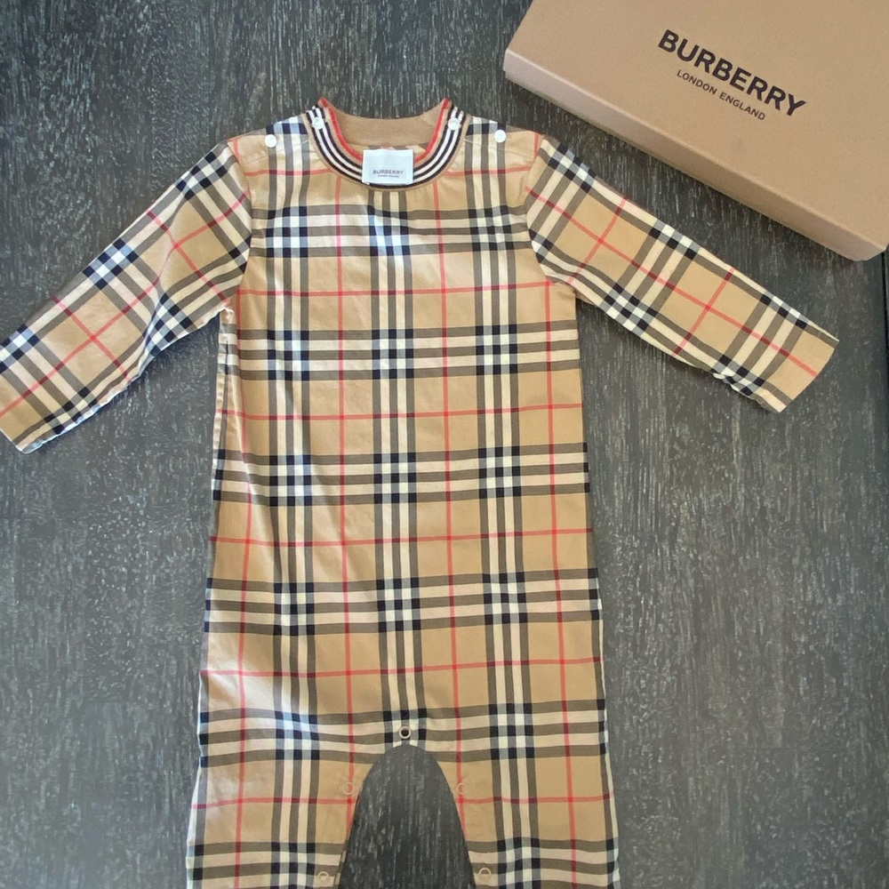 Original 18month Burberry jumpsuit l. Comes with purchase box.